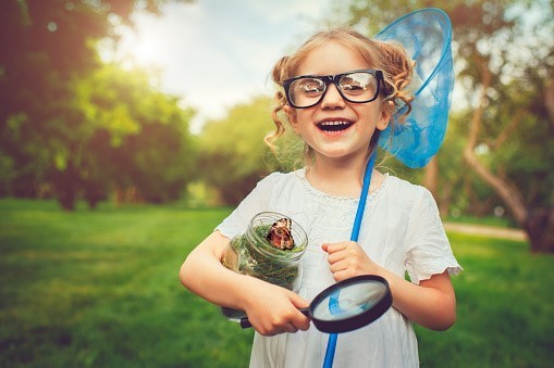 Student with a butterfly net