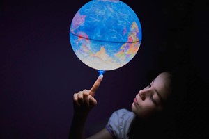 Student with globe image